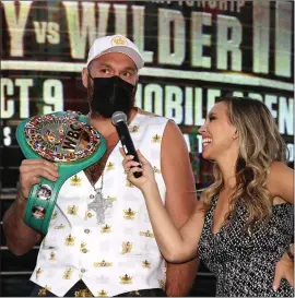  ?? ?? Tyson Fury being interviewe­d by Crystina Poncher during the grand arrivals at the T-Mobile Arena yesterday