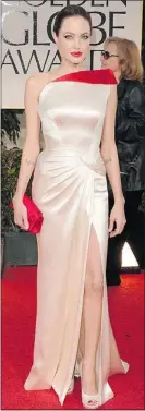  ?? — GETTY ?? Angelina Jolie dazzled in white at the Golden Globes.