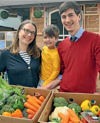  ?? ELEANOR WENMAN/STUFF ?? Kaibosh founders Robyn, left, and George Langlands visit the Kaibosh HQ with their son Lucas; left, when the pair founded the organisati­on.