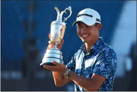  ?? CHRIS TROTMAN/GETTY IMAGES ?? Open Champion Collin Morikawa of United States celebrates with the Claret Jug after winning The 149th Open at Royal St George's Golf Club on Sunday in Sandwich, England.