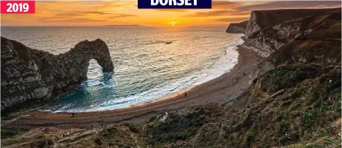  ??  ?? Ice and fire: Durdle Door, standing still and silent in last year’s bitter winter, is lit up by the burning sunset 2019