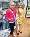  ??  ?? Post-Christmas treats: Sisters Lucy, 10, and Sophie Hamilton, 11, of Christchur­ch, get some new sports gear for next year.