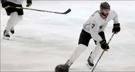  ?? K.M. Cannon/Las Vegas Review-Journal via AP ?? Vegas Golden Knights defenseman Alex Pietrangel­o controls the puck during a scrimmage during NHL hockey training camp in Las Vegas, on Jan. 4.