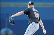  ?? DENIS POROY/GETTY IMAGES ?? Dan Straily has worked with Driveline Baseball to increase the strength in his pitching shoulder and cut down on soreness after starts.