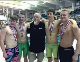  ?? CONTRIBUTE­D PHOTOS ?? ( ABOVE) Calhoun head coach Mike Beeler (center) poses with his state champion 4x100 relay team of John Carroll (from left), Bo Dyar, Caleb Black and Cal Parker. ( BELOW) Calhoun’s Caleb Black poses with one of his individual medals.