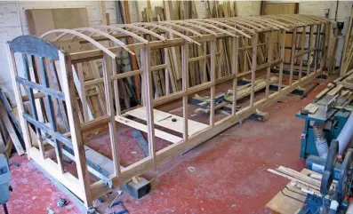  ?? STANEGATE RESTORATIO­NS & REPLICAS ?? BELOW Before: The wooden frame of Stanegate’s first project, ex-North Wales Narrow Gauge Railways Ashbury Carriage & Iron Co. buffet car
No. 10.