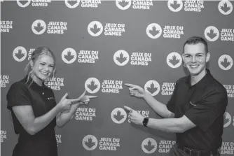  ?? JOE GIBBONS • THE TELEGRAM ?? Thursday, at Benvon’s Room in the Newfoundla­nd and Labrador Sports Centre, it was announced St. John’s will host the 2025 Canada Summer Games. Among those speaking at Thursday’s event were former Games athletes and youth/athlete committee members Nathan Young (right) and Jennifer Boland.