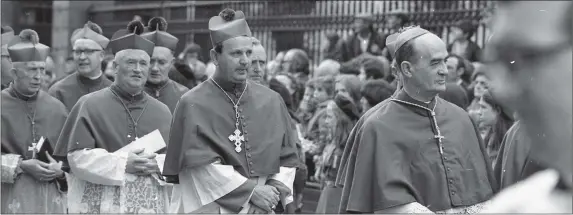  ?? (NPA and Independen­t Newspapers) ?? Bishop Eamon Casey (second right) and other bishops arriving for the funeral Mass in the Pro-Cathedral for the former Archbishop of Dublin Dr John Charles McQuaid in March 1973.