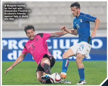  ??  ?? Mulgrew battles for the ball with Alessandro Florenzi in Scotland’s friendly against Italy in Malta last May.