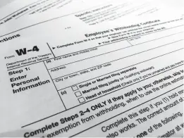  ?? PATRICK SISON/AP FILE PHOTO ?? The IRS will delay the traditiona­l April 15 tax filing due date until May 17 to cope with added duties and provide Americans more flexibilit­y.