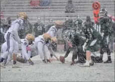  ?? BY JOE BOYLE JBOYLE@ DIGITALFIR­STMEDIA.COM @BOYLERALER­TTROY ON TWITTER ?? Shen and CBA faced off in the snow on April 1 at Shen High School in Clifton Park.