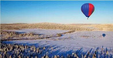  ?? ?? Serene beauty: Hop on board a hot-air balloon and experience the wilderness of the Arctic