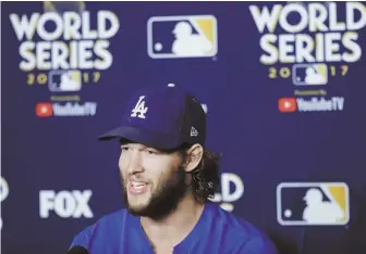  ?? AP PHOTO ?? HAPPY TO BE THERE: Dodgers ace Clayton Kershaw is all smiles as he talks yesterday about starting in Game 1 of the World Series.