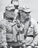  ?? Joel Martinez / Associated Press ?? U.S. Sen. Ted Cruz, R-Texas, right, takes a boat tour on the Rio Grande with state troopers before a March 26 news conference in Mission.