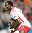  ?? Foto: dpa ?? Leipzigs Jean Kevin Augustin (unten) und Bruma freuen sich über die starke Leistung gegen Porto.