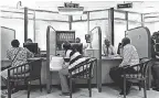  ??  ?? Customers do business at an Equity Bank in Nairobi, Kenya, in February. Banks are flourishin­g in Africa. AFP