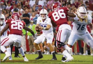  ?? (Special to the NWA Democrat-Gazette/David Beach) ?? Josh Love (center) threw for 402 yards and two touchdowns to lead San Jose State past Arkansas in a 2019 game that Nevada Coach Jay Norvell got a good look at with an eye toward this year’s matchup against the Razorbacks on Sept. 5 at Reynolds Razorback Stadium.