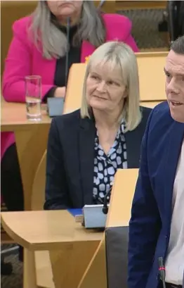  ?? ?? Scottish Conservati­ve leader Douglas Ross took issue with Angus Robertson and First Minister Humza Yousaf at different points during FMQs