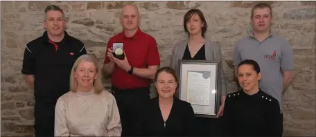  ??  ?? The Munster Fire and Safety team photograph­ed with their All-Star Accreditat­ion certificat­e and medallion.