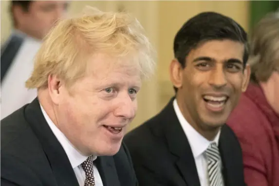  ?? (Getty) ?? What do Boris Johnson and Rishi Sunak have up their sleeves?