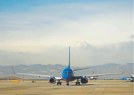  ?? Joe Amon, The Denver Post ?? Southwest Airlines officials were in Denver this week for an annual get-together, and one executive said the Dallas-based carrier wants to absorb 16 new gates planned in DIA’s expansion, which would mean an additional 100 flights per day.