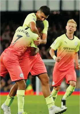  ?? Photo: Evening Standard ?? Manchester City players celebrate a goal against Everton in the English Premier League match at Goodison Park in Liverpool, England on September 29, 2019.