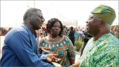  ?? Sunday Adigun ?? L-R; Senior Pastor, KICC Church, Pastor Mathew Ashimolowo; his wife, Mrs. Yemisi Ashimolowo; and Senator Iyiola Omisore at the 12th Pastor Mathew and Yemisi Ashimolowo annual empowermen­t programme at Ode-Omu, Osun State.....weekend