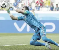  ??  ?? Egypt goalkeeper Essam El Hadary claims the ball during the Group A FIFA World Cup match against Saudi Arabia at the Volgograd Arena in Volgograd, Russia.