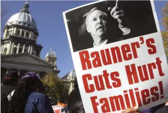  ??  ?? Protesters rally in support of lawmakers ending the state budget impasse at the Illinois state Capitol in Springfiel­d.