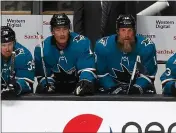  ?? NHAT V. MEYER — BAY AREA NEWS GROUP ?? San Jose Sharks’ Patrick Marleau (12) and San Jose Sharks’ Joe Thornton (19) sit on the bench during their game against the Calgary Flames in the second period at the SAP Center in San Jose on Oct. 13, 2019.