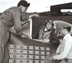  ??  ?? Lt. Col. Francis Gabreski and ground crew displaying 27 victories on July 4, 1944. (Photo courtesy of Stan Piet)