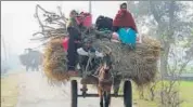  ?? PTI ?? Villagers move to safer places after heavy shelling by Pakistani forces in RS Pura Sector on Sunday.