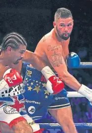  ??  ?? Tony Bellew, right, on his way to defeating David Haye during a heavyweigh­t encounter in London