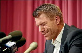  ?? PHOTO: GETTY IMAGES ?? A tearful David Warner fronts the media after his ban for balltamper­ing.