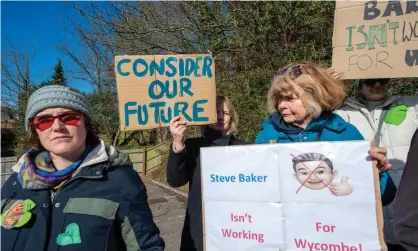  ?? Photograph: Maureen McLean/Rex/Shuttersto­ck ?? Members of the Steve Baker Watch protesting against the MP’s views outside the Conservati­ve Associatio­n in High Wycombe in February. Baker has complained of ‘hysterical misinforma­tion’ over fracking.