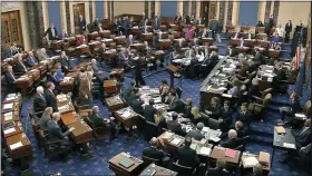  ?? SENATE TELEVISION VIA AP ?? In this image from video, Senators cast their vote on the motion to allow additional witnesses and evidence to be allowed in the impeachmen­t trial against President Donald Trump in the Senate at the U.S. Capitol in Washington, Friday, Jan. 31. The motion failed with a vote of 51-49.