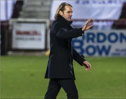 ??  ?? Hearts manager Robbie Neilson watched on as his side struggled to create clear-cut opportunit­ies