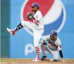  ??  ?? CLEVELAND: Francisco Lindor #12 of the Cleveland Indians forces out Carlos Asuaje #20 of the San Diego Padres at second base during the fifth inning at Progressiv­e Field on Tuesday in Cleveland, Ohio. The Padres defeated the Indians 1-0. — AFP