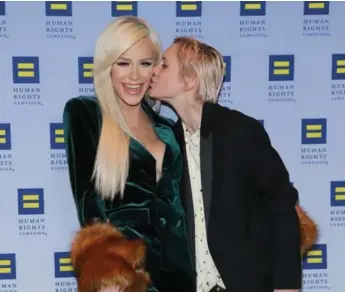  ?? ROB KIM/GETTY IMAGES ?? Canadian YouTube star Gigi Gorgeous, subject of the documentar­y This Is Everything, with her partner Nats Getty.