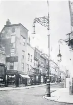  ??  ?? Looking from The Cross towards The Bell Hotel a century ago