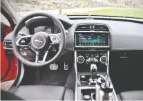  ??  ?? The interior of the 2020 Jaguar XE is the biggest beneficiar­y of the new model’s facelift, with sharp-looking climate controls, an easy-to-navigate infotainme­nt panel and a snappy new steering wheel.