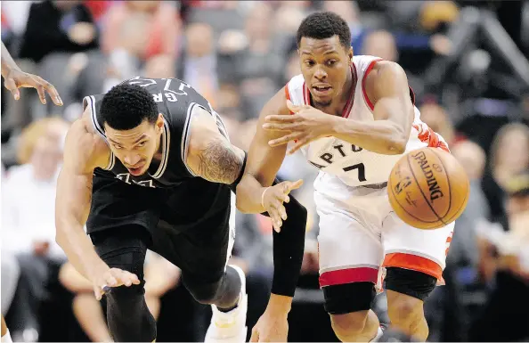  ?? FRANK GUNN / THE CANADIAN PRESS ?? Finding a way to cut back the heavy workload of guard Kyle Lowry, right, will be a key to the Toronto Raptors’ potential post-season success.