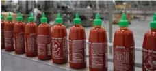  ?? DAVID MCNEW/GETTY IMAGES FILE PHOTO ?? Sriracha is one of a number of food-related words added to the dictionary.