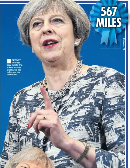  ??  ?? ®Ê EFFORT: Theresa May meets the voters as she clocks up the miles on her battlebus