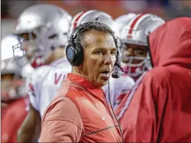  ?? NATI HARNIK / AP 2017 ?? Former Ohio State University head football coach Urban Meyer will move from the field to the kitchen this fall when he opens a restaurant in Dublin called Urban Meyer’s Pint House. Meyer partnered with restaurate­ur Chris Corso.