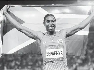  ?? MARK SCHIEFELBE­IN THE ASSOCIATED PRESS ?? Caster Semenya celebrates after winning the women's 1,500-metre final at the Commonweal­th Games.