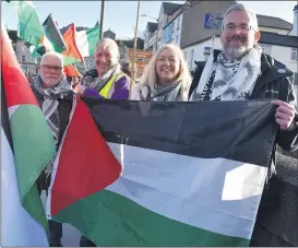  ?? (Photo: Katie Glavin) ?? Ted Myers, Kieran Campbell, Imeda O’Donovan, and Dermot Barry, the founders of the Fermoy Palestine Solidarity Campaign, who are raising awareness locally, pictured on Kent Bridge, Fermoy on Friday.