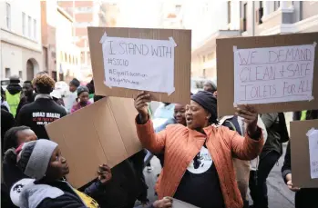  ?? PICTURE: HENK KRUGER ?? VOICE: People picket outside the Western Cape High Court, where the Social Justice Coalition is challengin­g the criminalis­ation of peaceful protests.