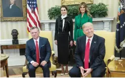  ??  ?? WASHINGTON: US President Donald Trump meets with King Abdullah II of Jordan in the Oval Office at the White House as First Lady Melania Trump and Queen Rania look on yesterday.