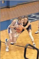  ?? Barbara Hall ?? A Gordon Central player battles a defender for a loose ball in recent 2A Region 7 action for the Lady Warriors.